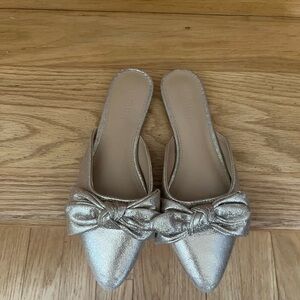 Gold bow slip ons/ mules